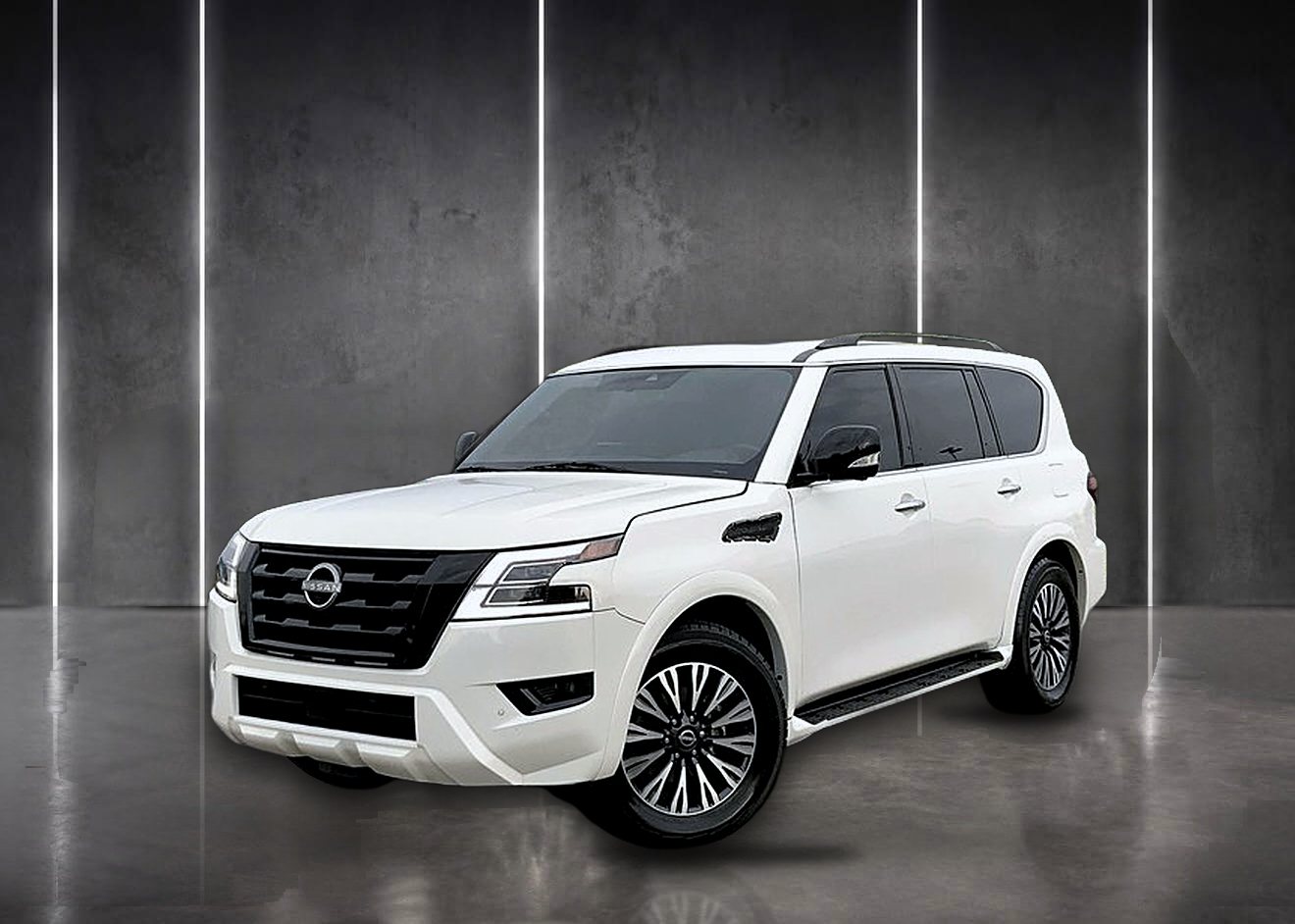 White Nissan Armada luxury SUV with captain's chairs for car service in North Jersey